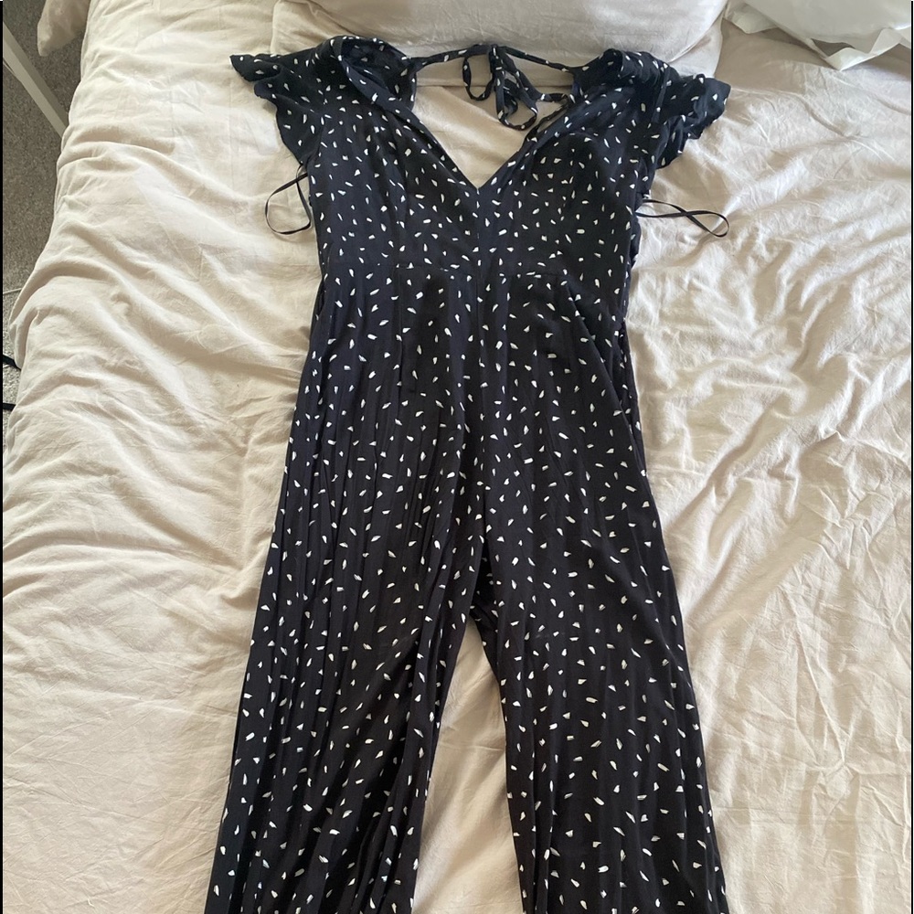 Lulu’s Flutter Sleeve Open Back Jumpsuit